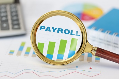 Payroll chart with magnifying glass